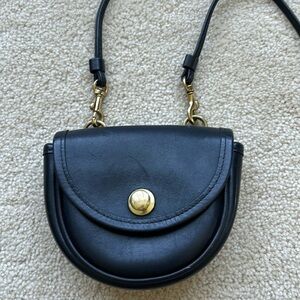 Vintage Coach mini cross body purse .